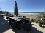 Oceanfront patio offers outdoor dining set, dine alfresco with unbeatable sunset views